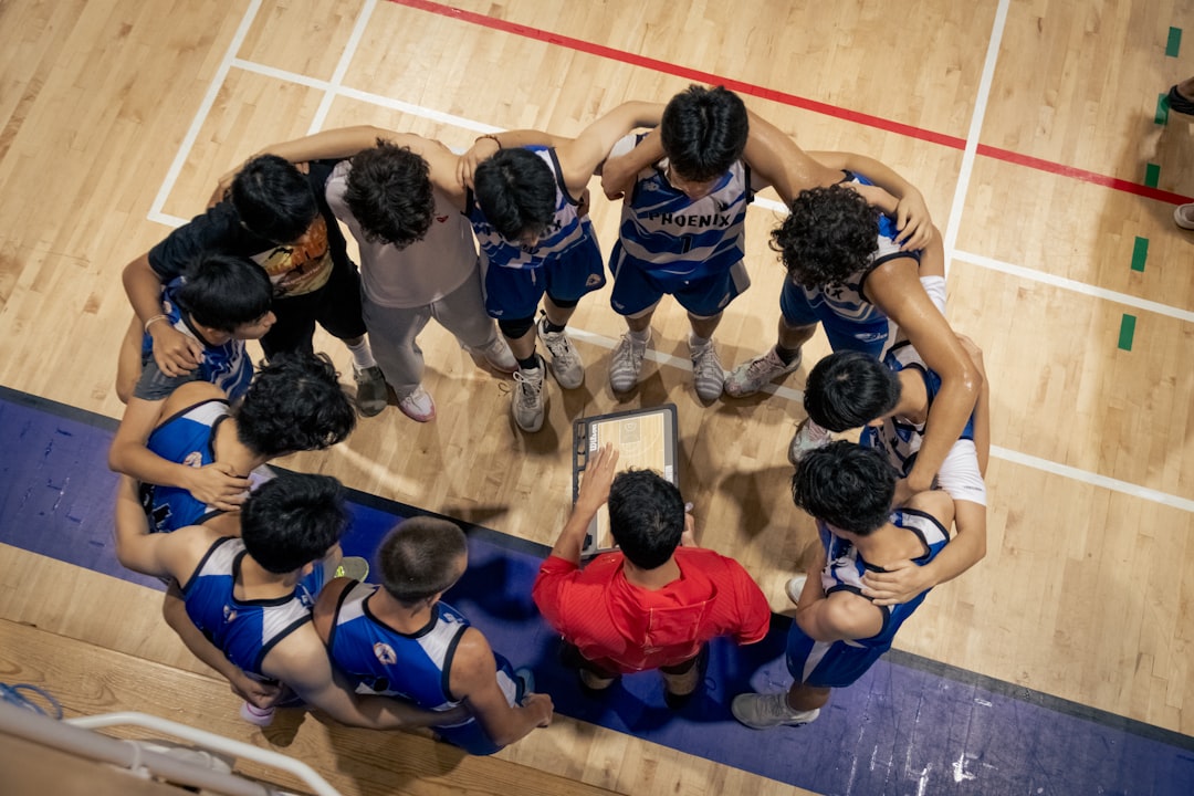 Mixed social basketball game on an indoor court