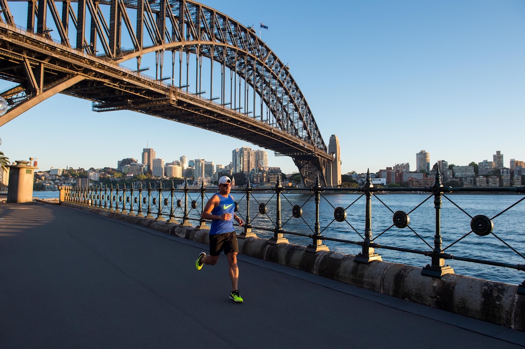 Runners crossing the Sydney Harbour Bridge during a marathon event
