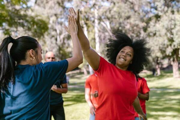 American Football (NFL) throwing or running in Glenferrie oval or St Kilda Beach image