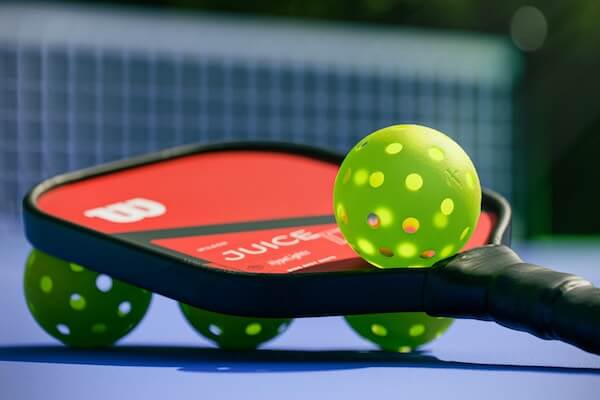 Pickleball racquet and ball